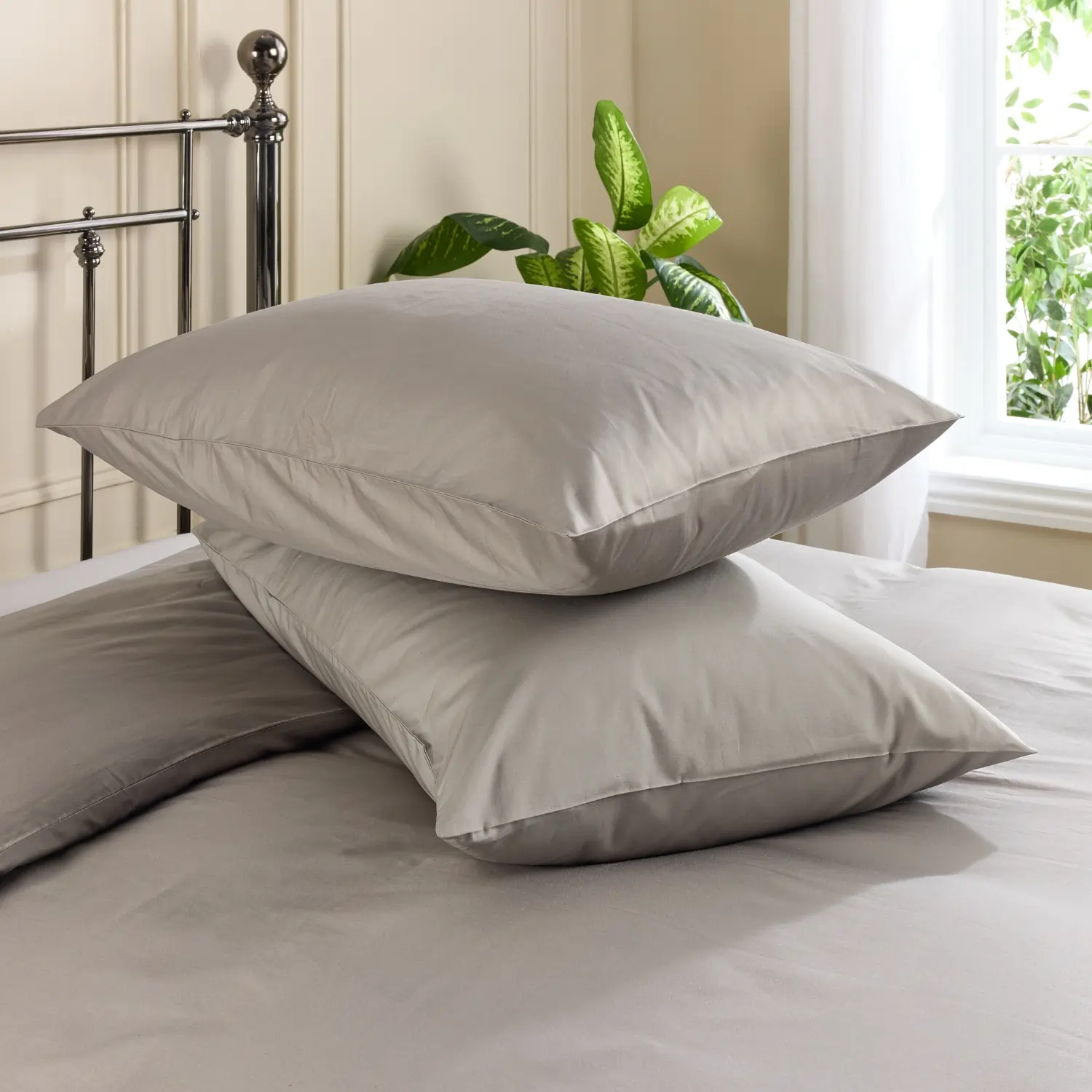 Two pillows with grey coloured Hotel Pure Luxury classic standard pillowcases