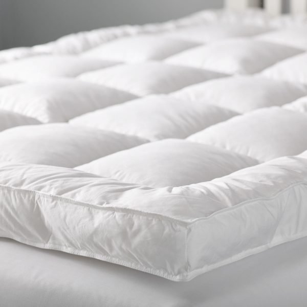 A quilted polyester fibre fill mattress topper from the luxury Liddell range