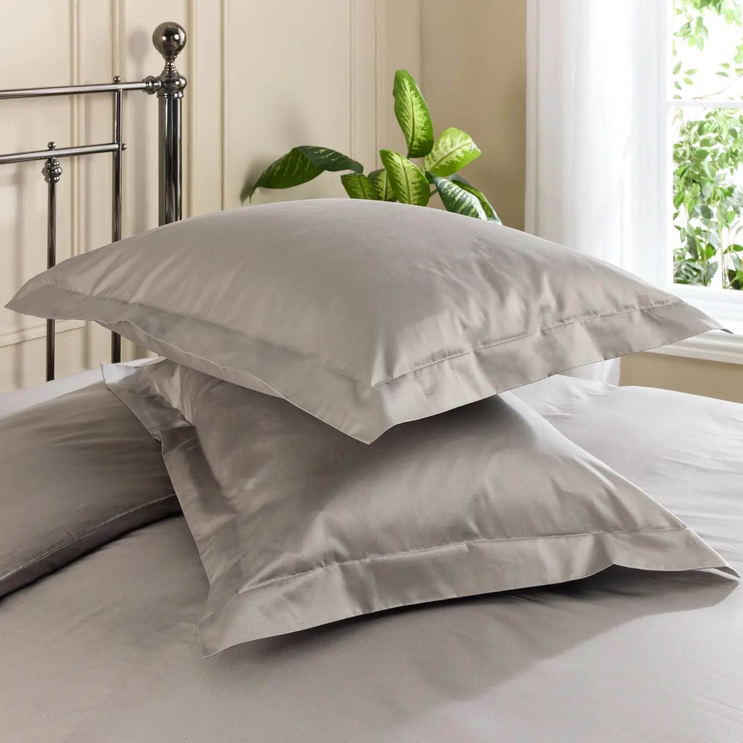 Two pillows with grey coloured Hotel Pure Luxury Oxford pillowcases