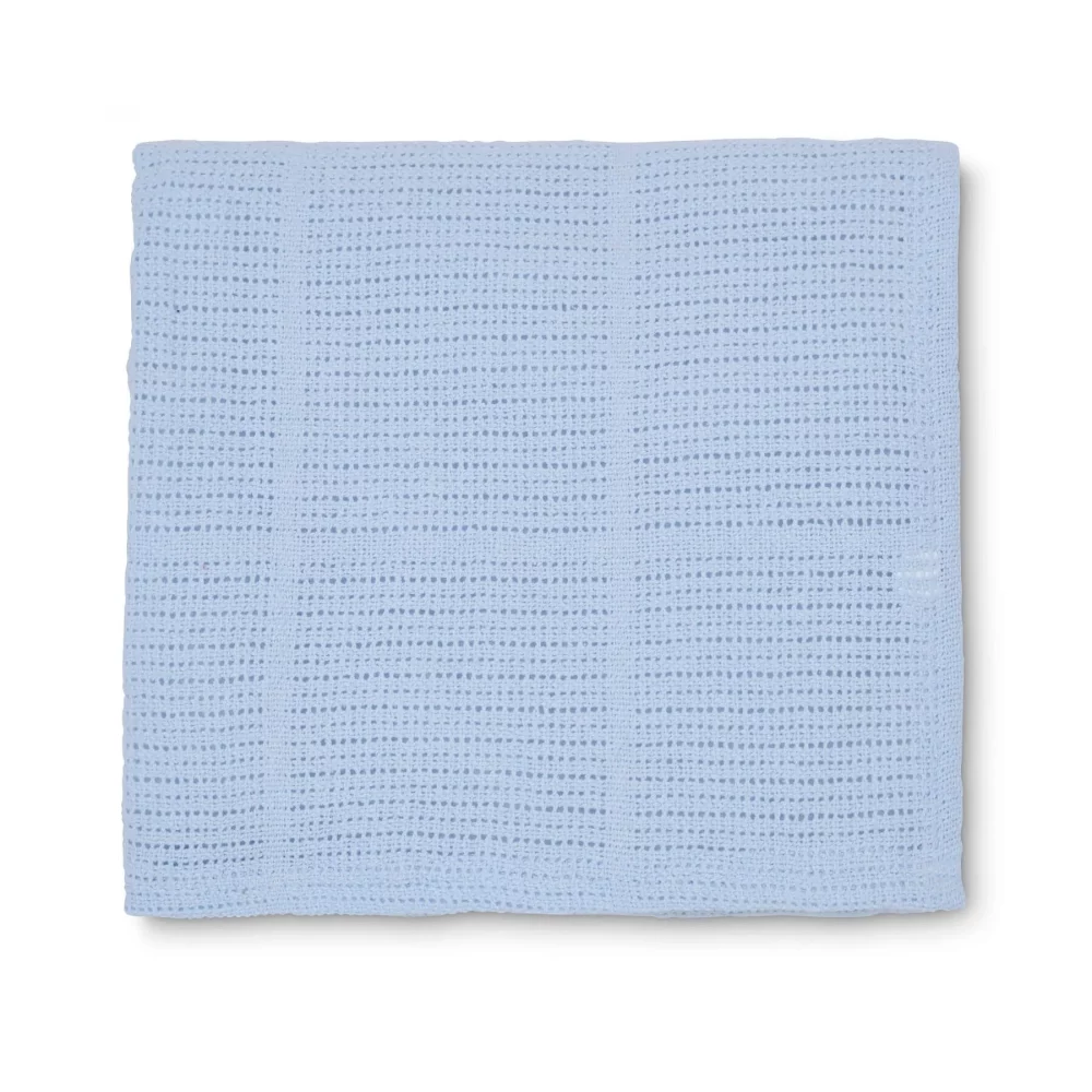 A blue cellular blanket for use with babies from the Martex Baby range