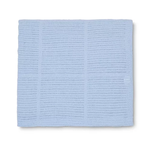 A blue cellular blanket for use with babies from the Martex Baby range