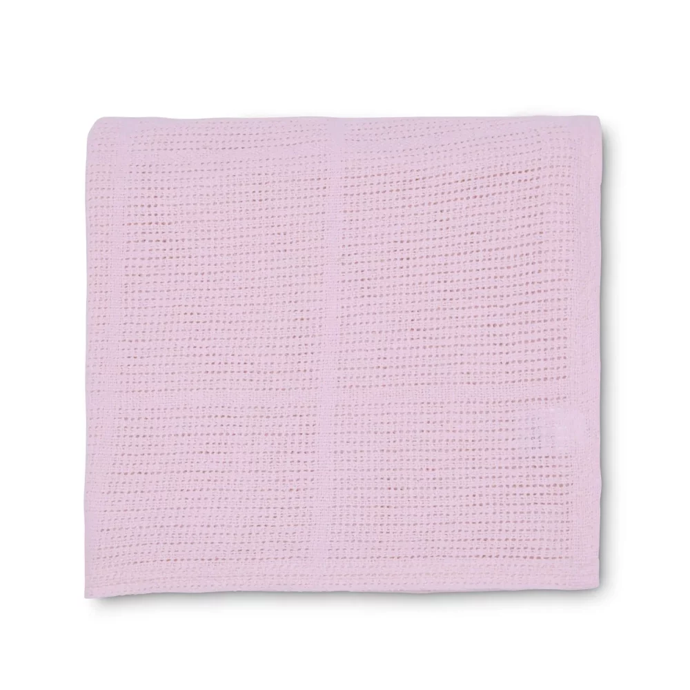 A pink cellular blanket for use with babies from the Martex Baby range