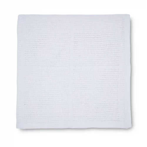 A white cellular blanket for use with babies from the Martex Baby range