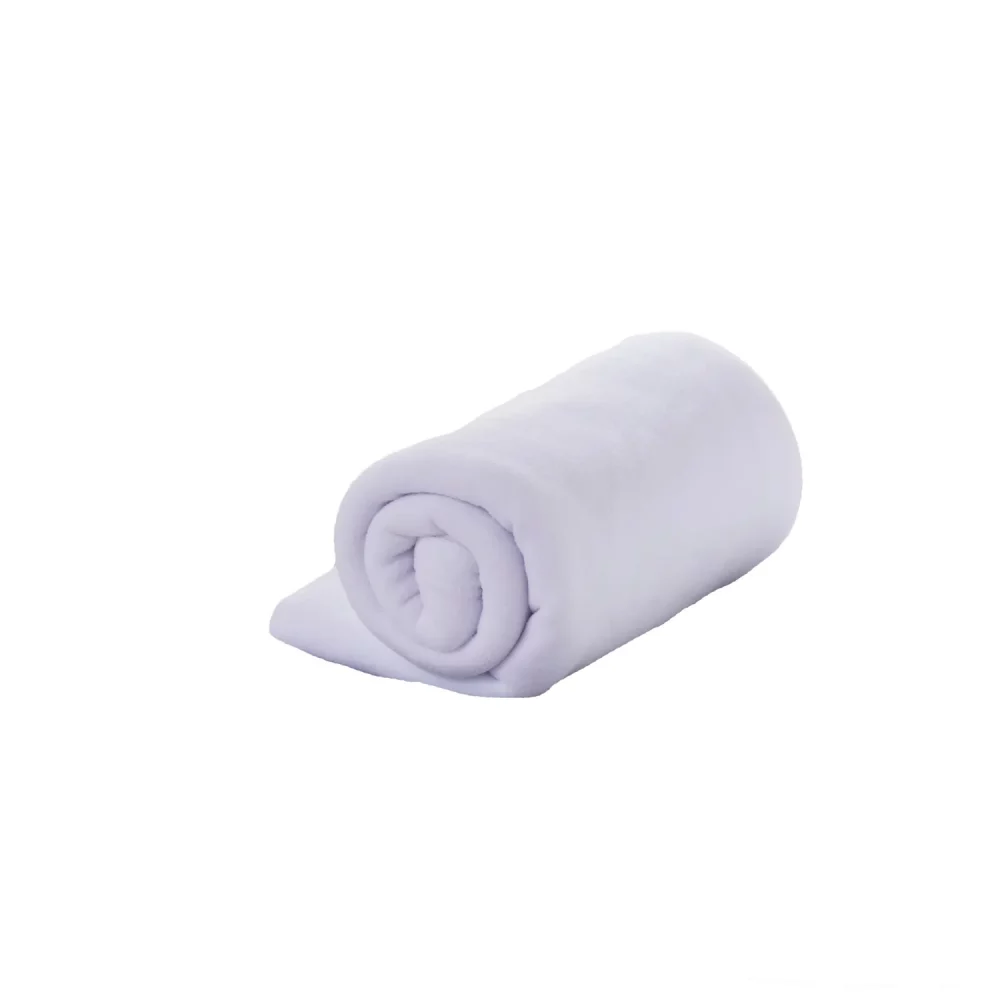 A white Martex Baby polar fleece blanket.