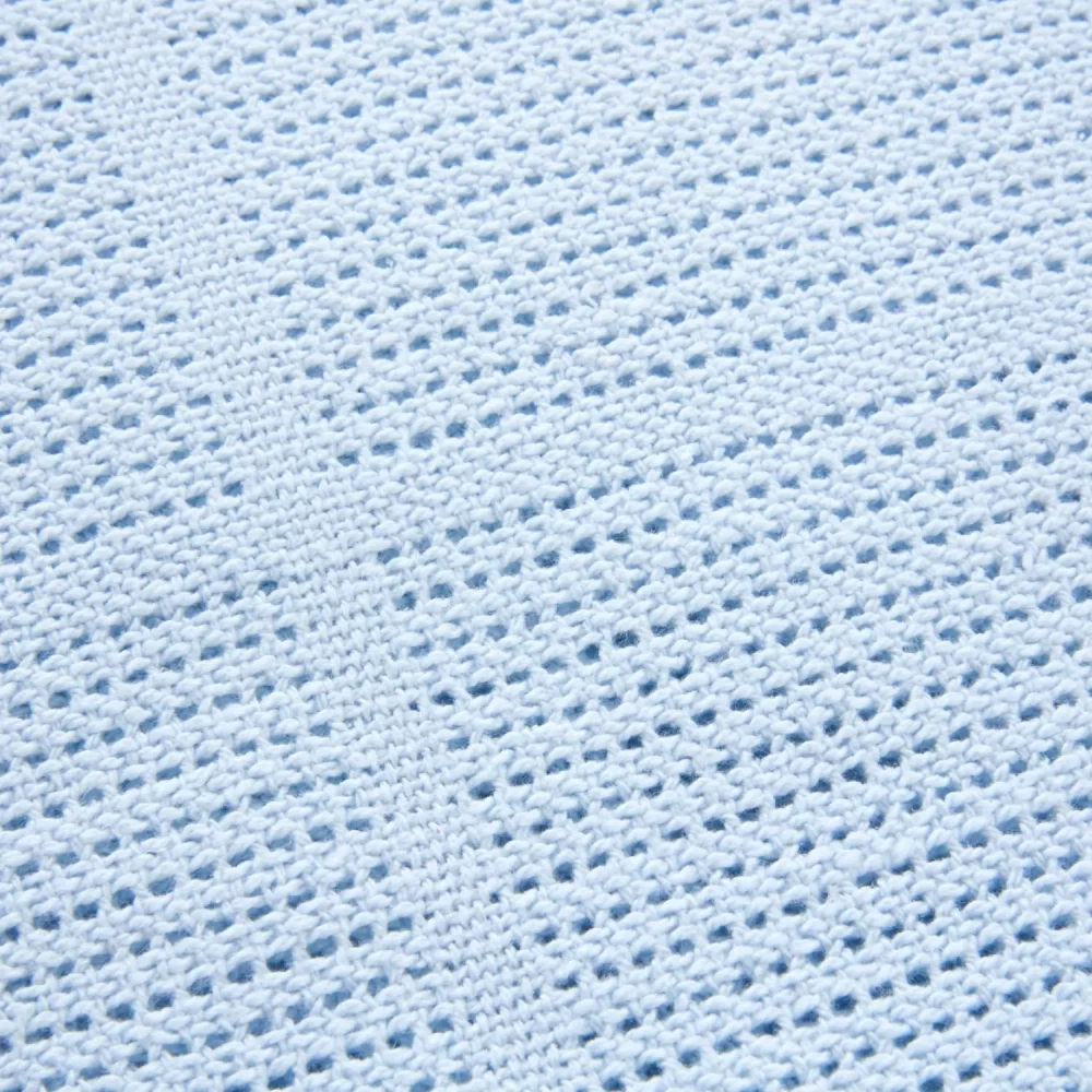 A close up of a blue Clair De Lune cotton cellular blanket