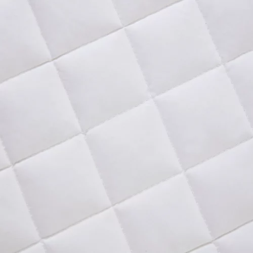 Close up of a Clair De Lune anti-allergy 4 tog wool cot bed duvet. It has a squared grid design.