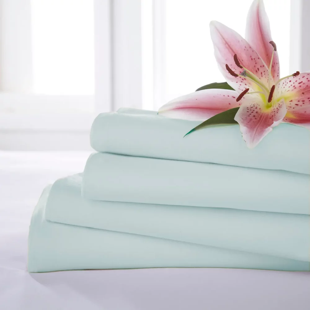 Duck egg Martex Percale Housewife Pillowcases stacked upon each other